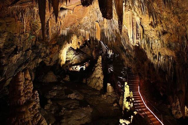 Dim Cave & River