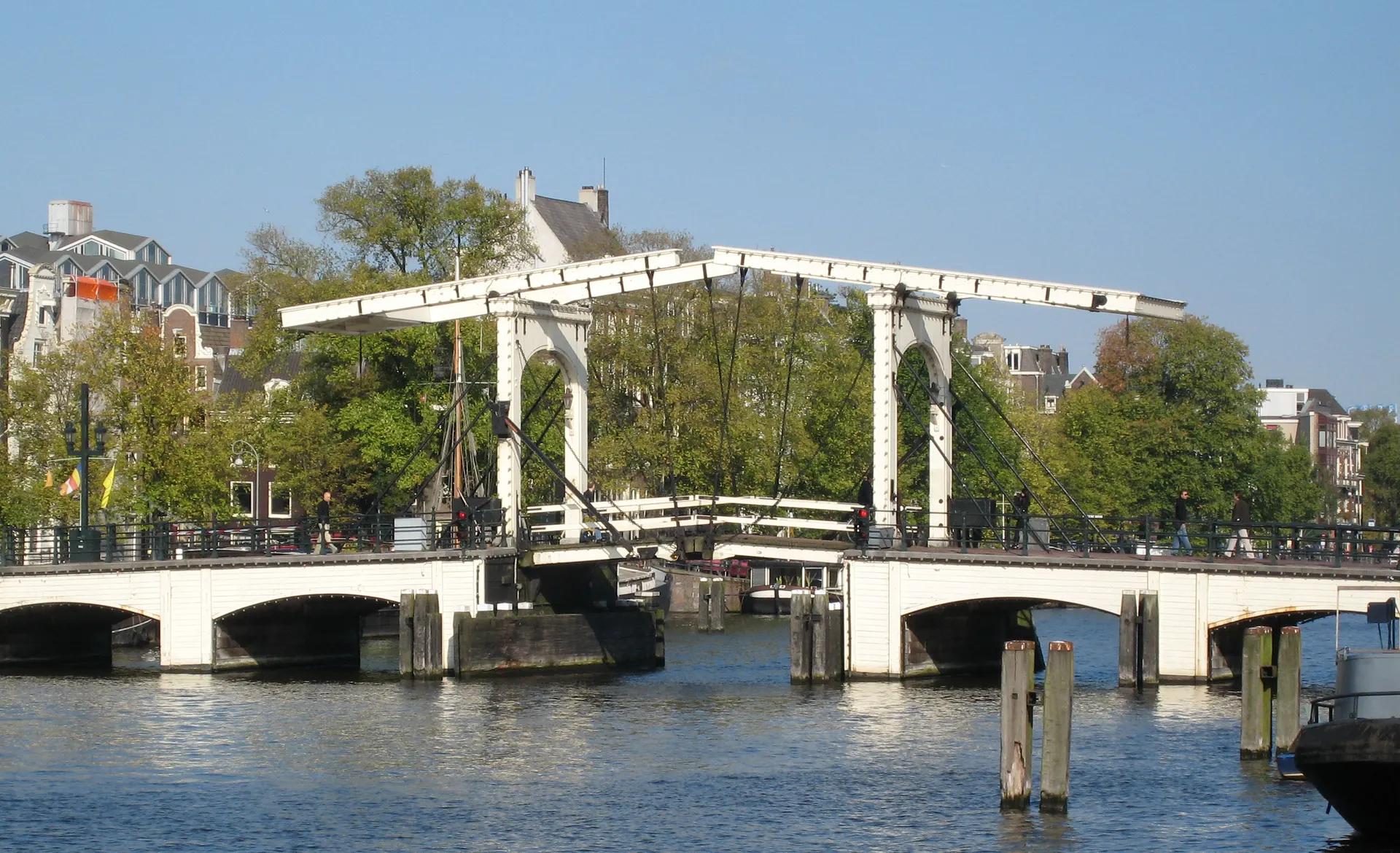 The white wooden Magere Brug drawbridge over the Amstel