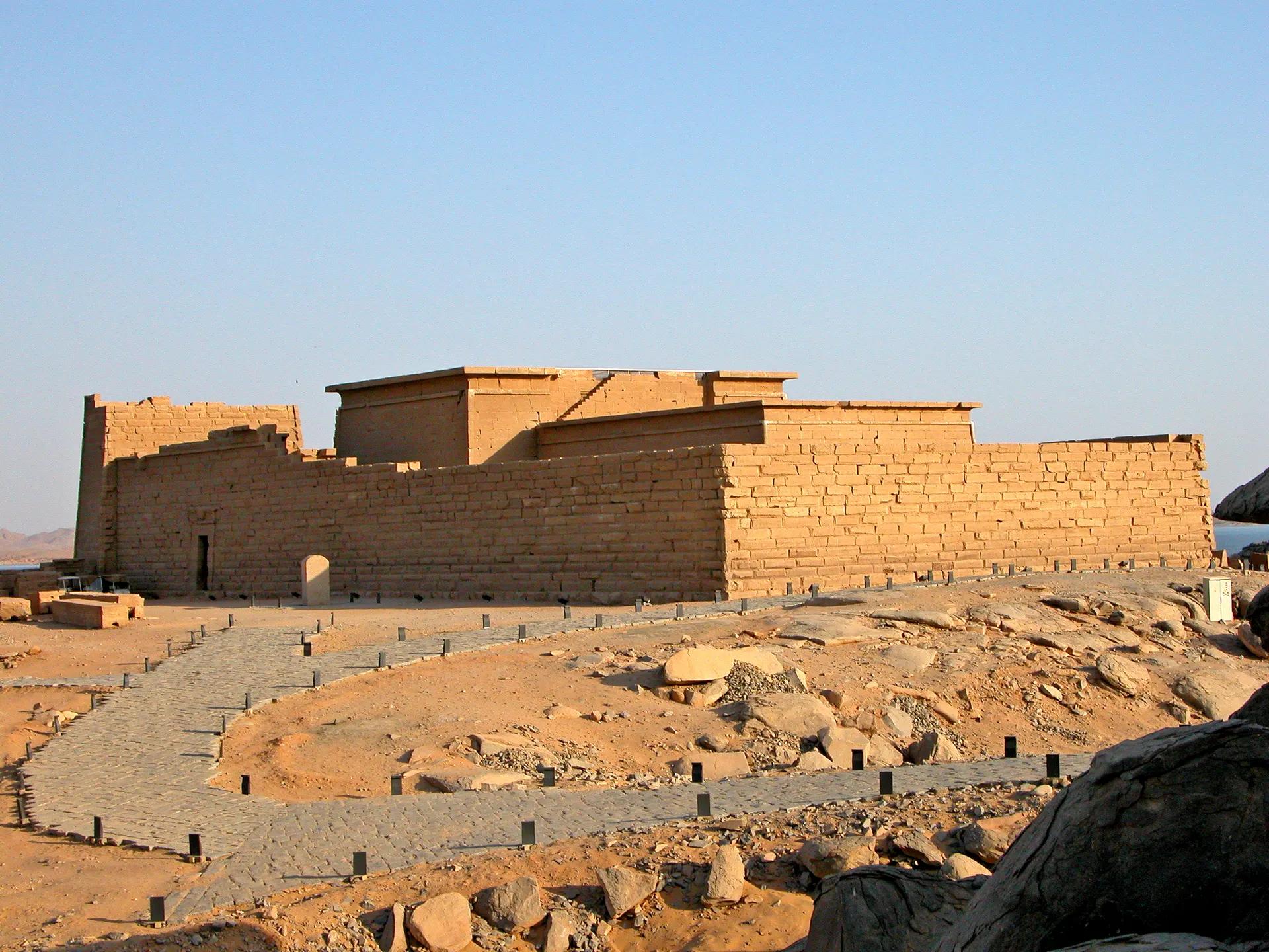 Sandstone walls of Kalabsha Temple on its rocky site near Lake Nasser