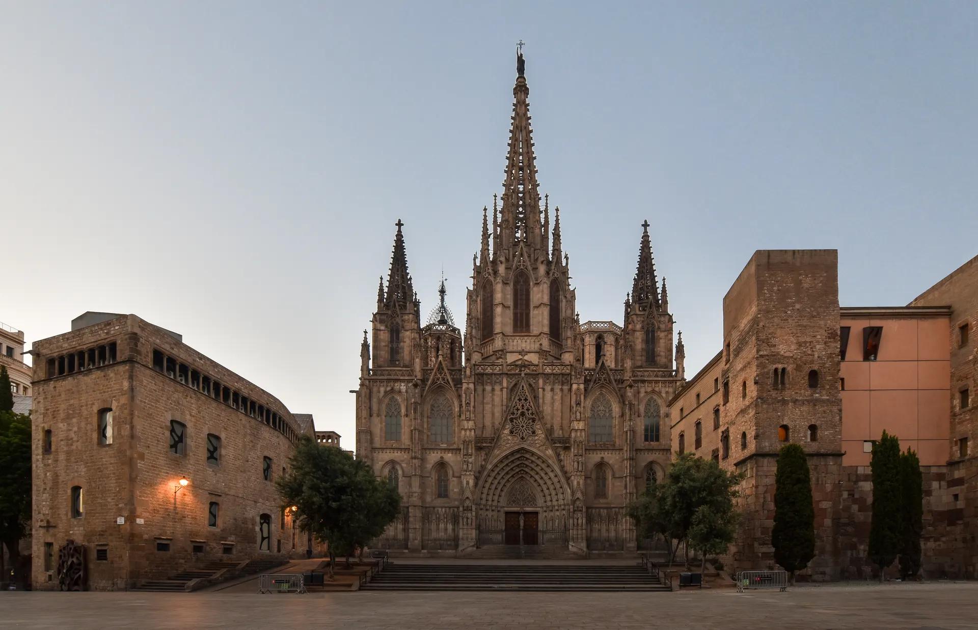 Gothic main façade of Barcelona Cathedral at sunrise