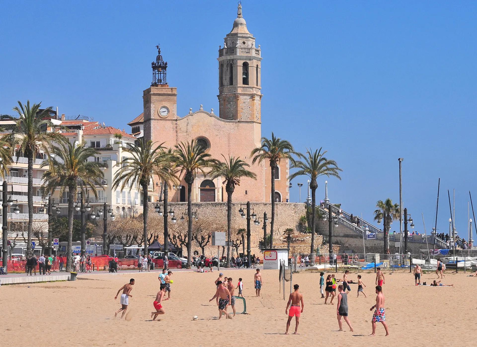 Sitges beach with the parish church behind