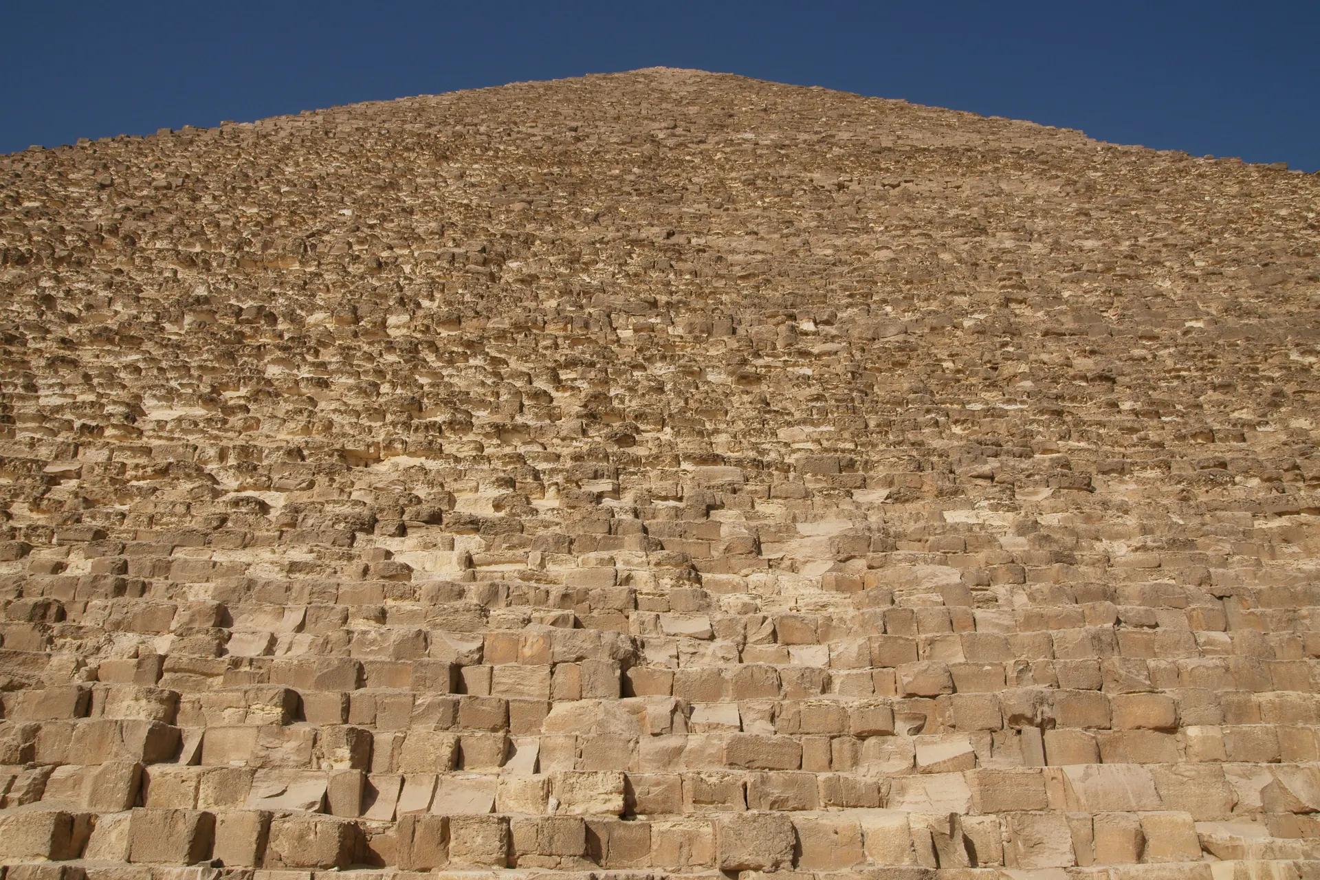 Stepped limestone blocks of the Great Pyramid seen from its base