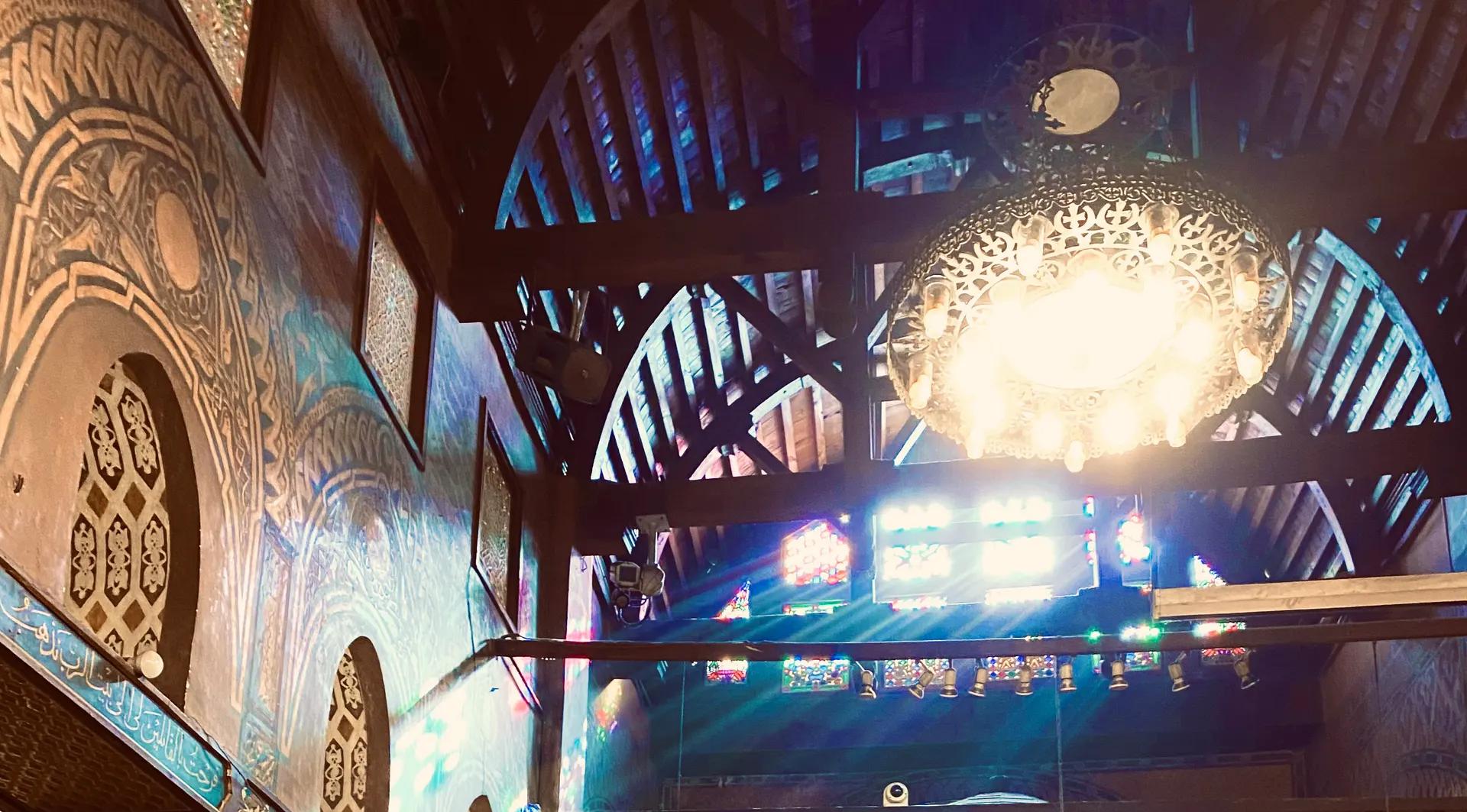 Painted walls and wooden roof beams inside the Hanging Church