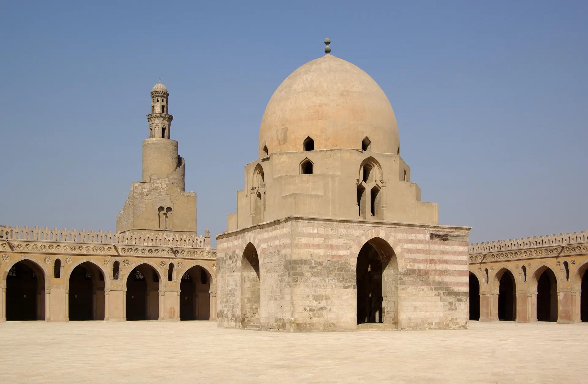 Courtyard of the Mosque of Ibn Tulun with its domed fountain and spiral minaret