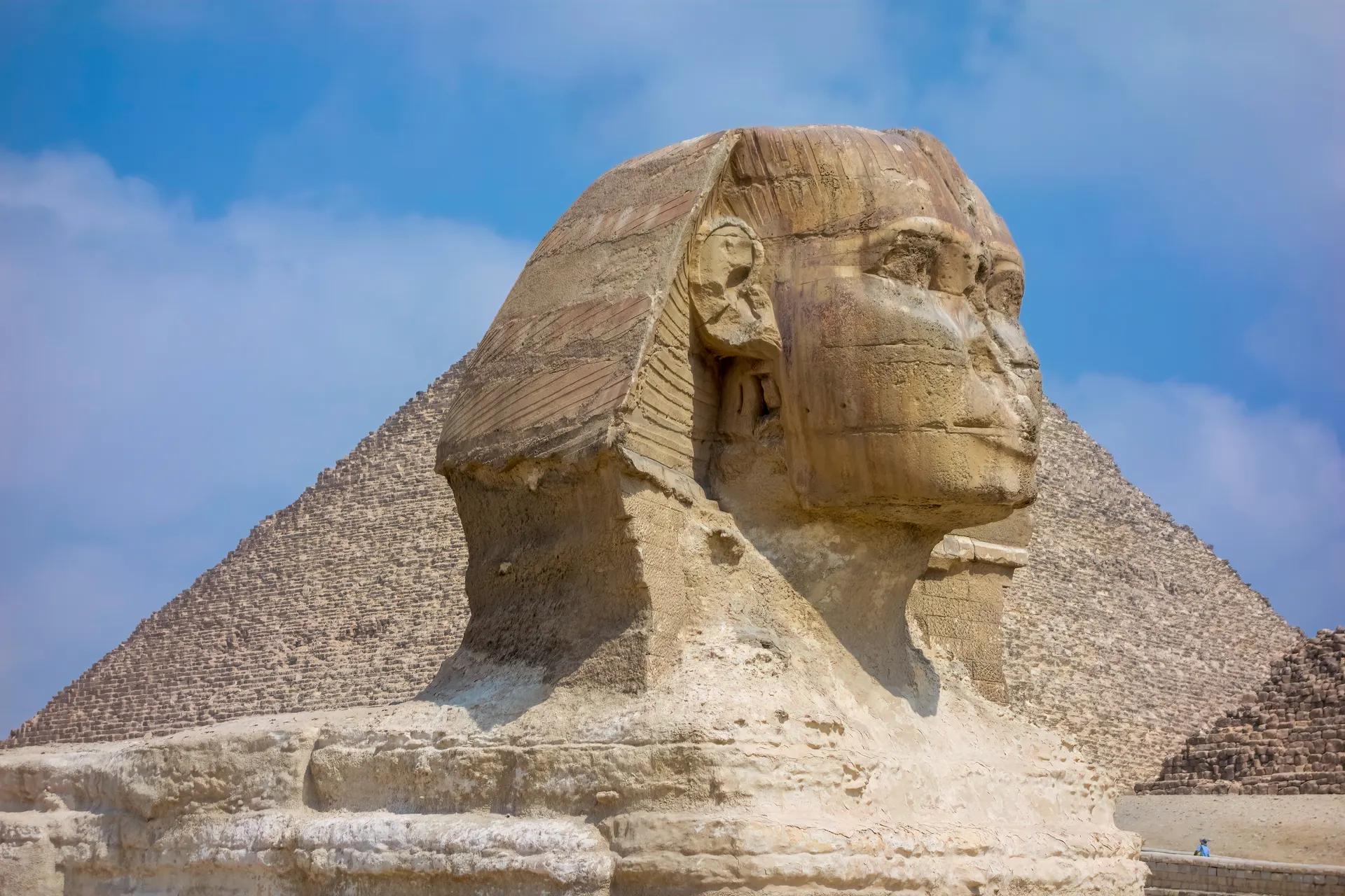 Head of the Great Sphinx with the Pyramid of Khafre behind it