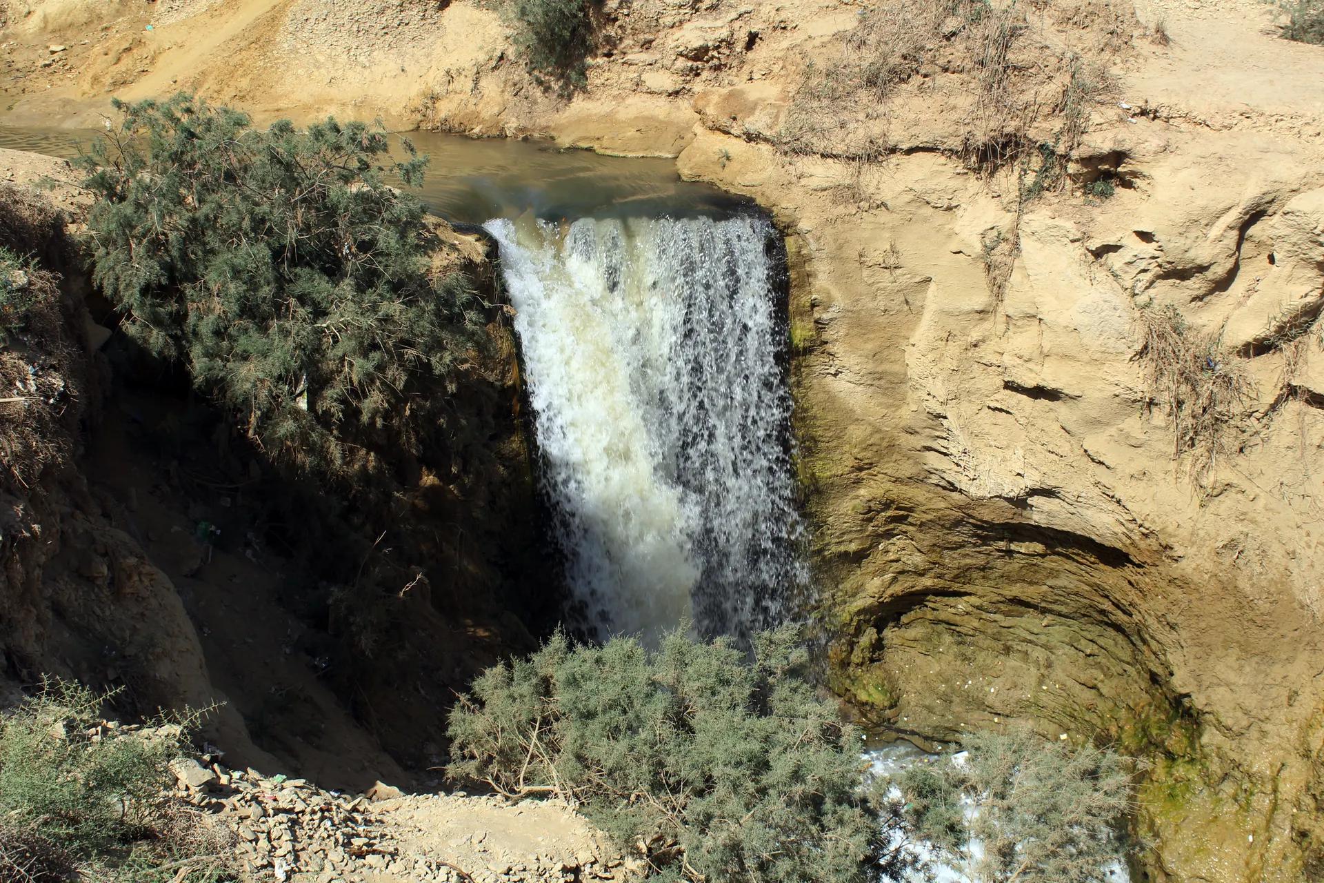 Waterfall between sandy banks at Wadi El Rayan in Faiyum
