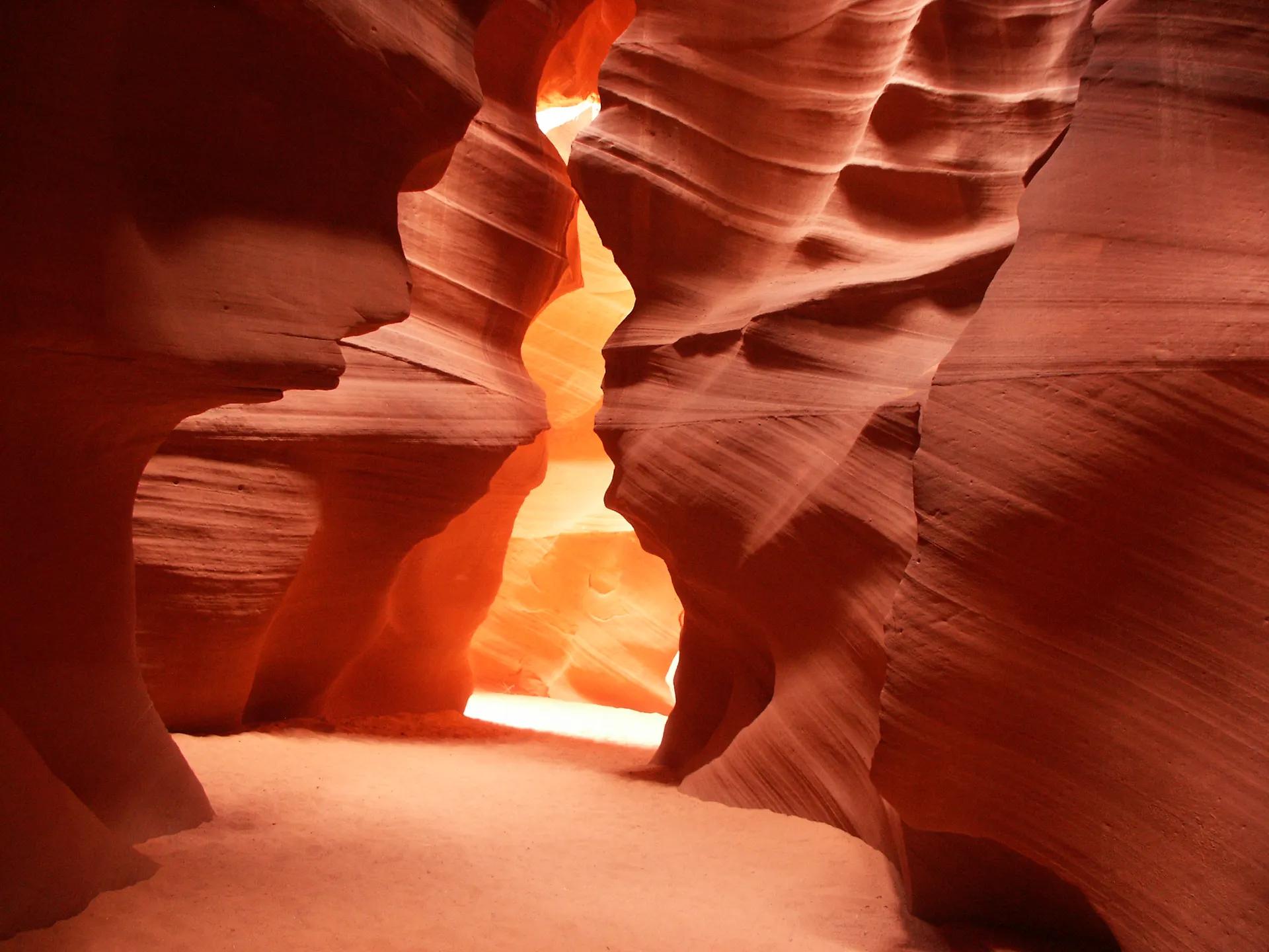 Light falling into the curved sandstone walls of Lower Antelope Canyon
