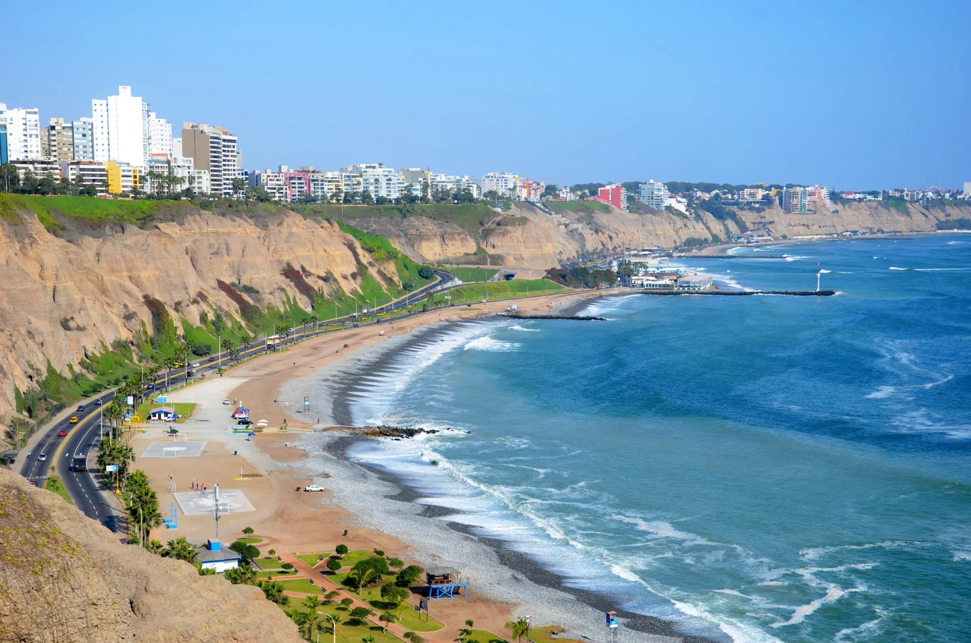 Miraflores clifftop skyline above the Costa Verde beach and coast road