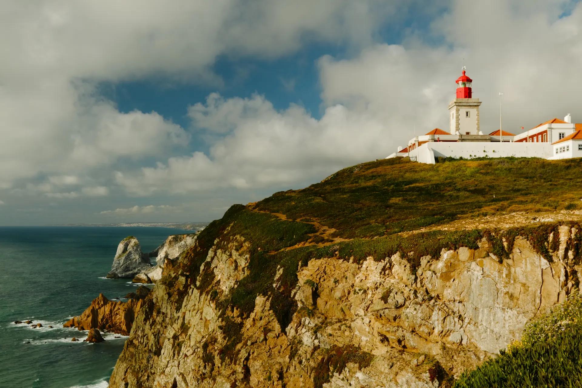 Cabo da Roca lighthouse on top of cliffs above the Atlantic