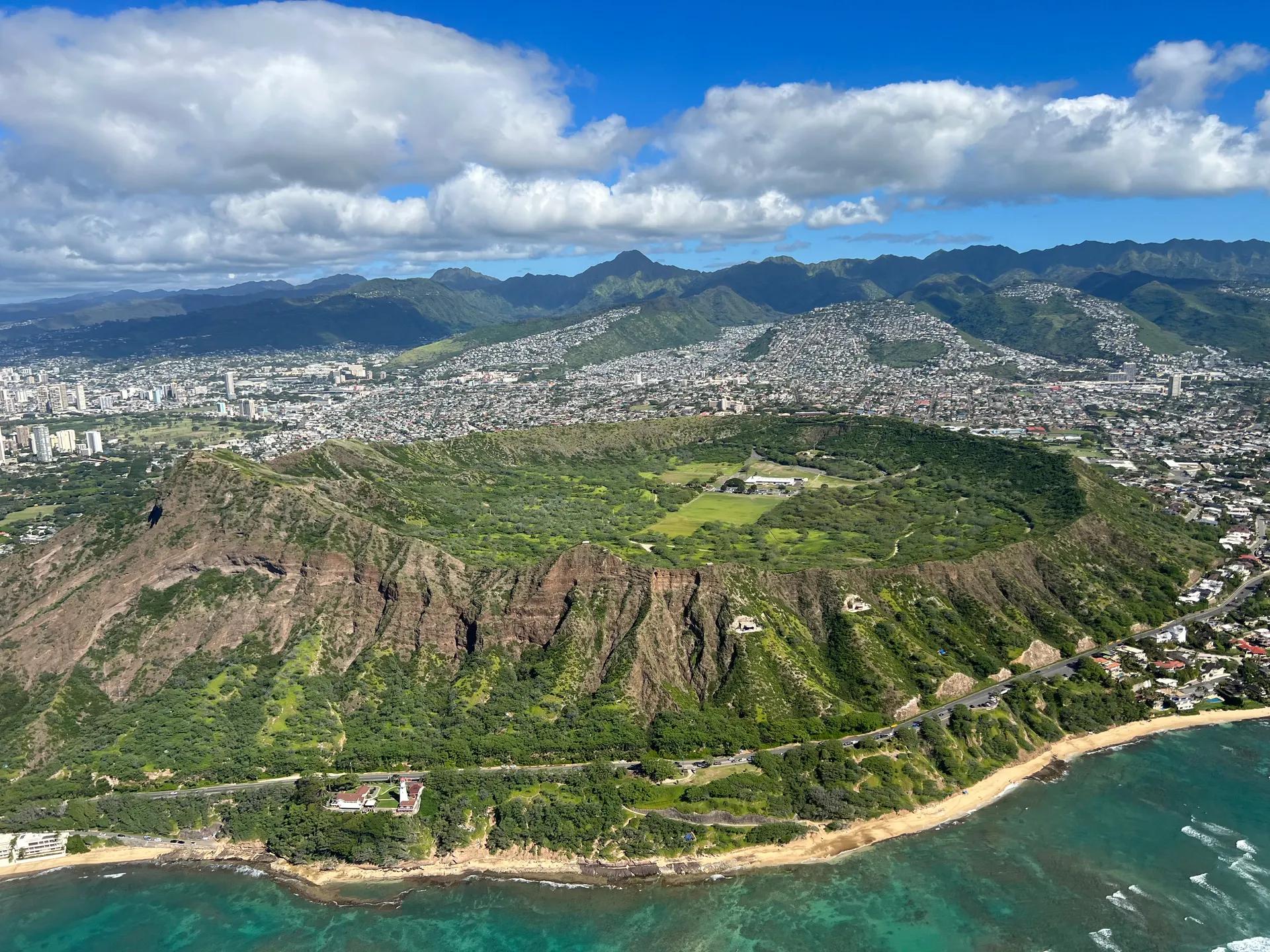 Aerial view of Diamond Head crater above the Honolulu coast