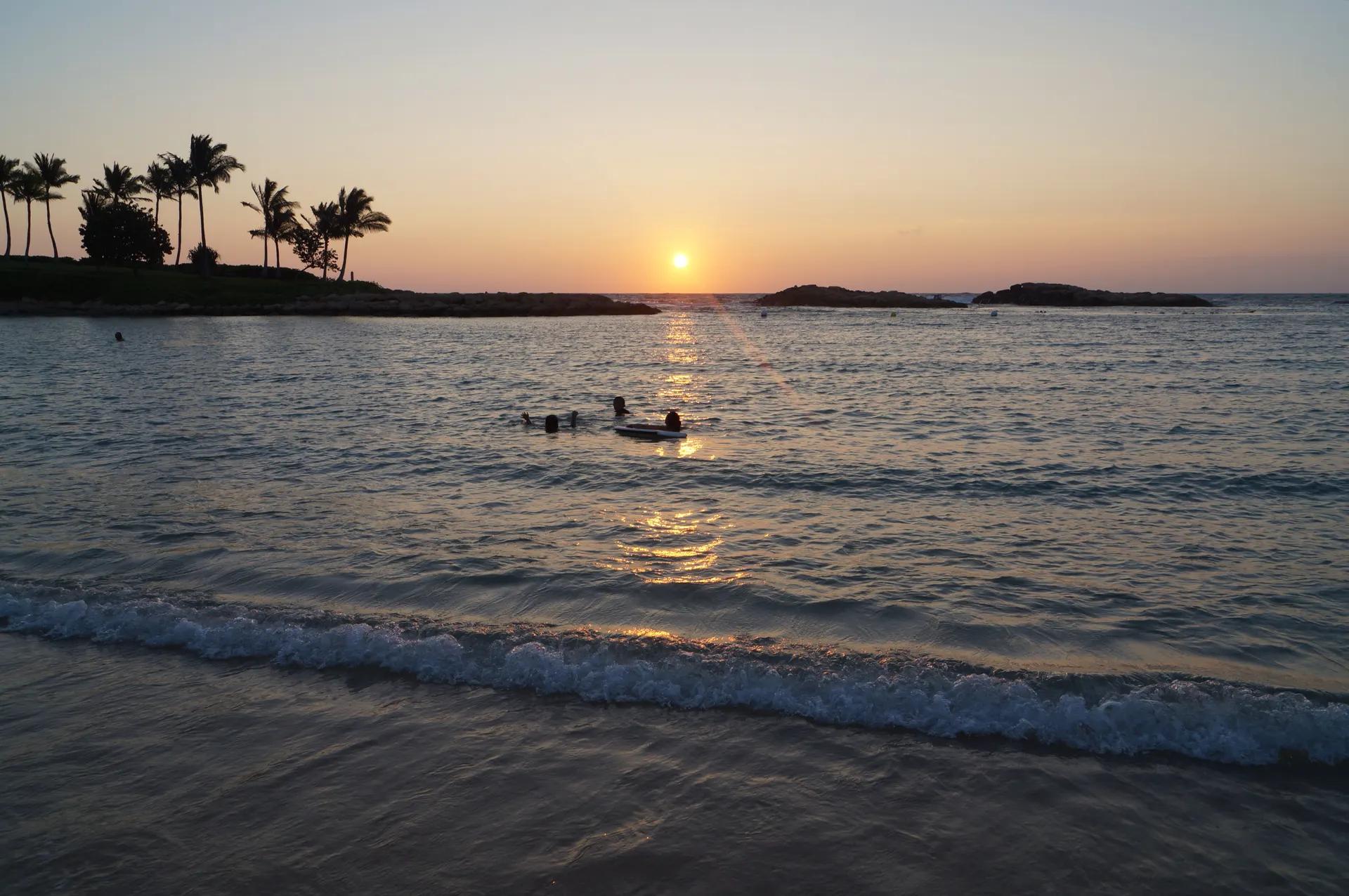 Sunset over a calm lagoon at Ko Olina