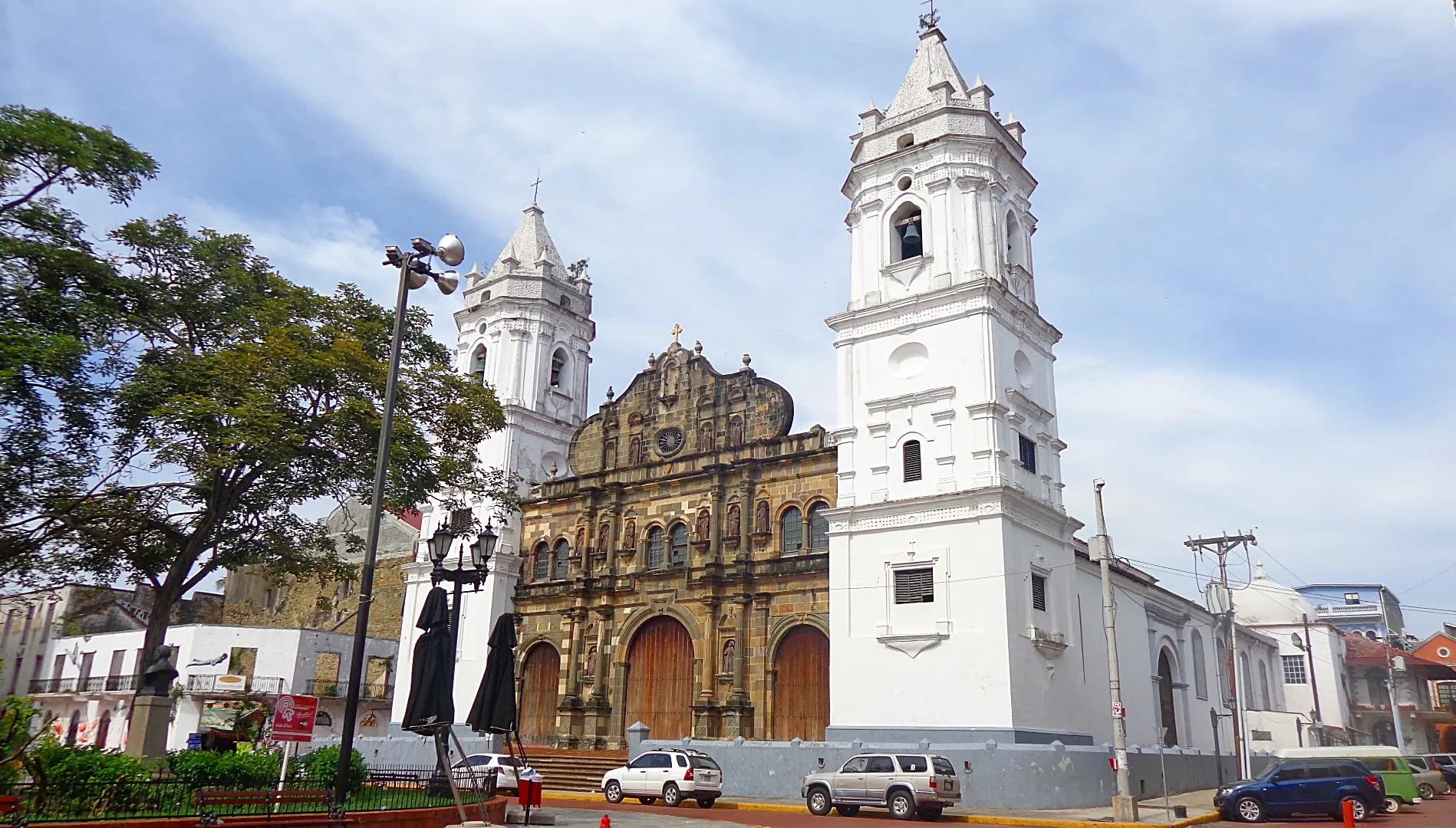 White bell towers and stone facade of the Metropolitan Cathedral in Casco Antiguo