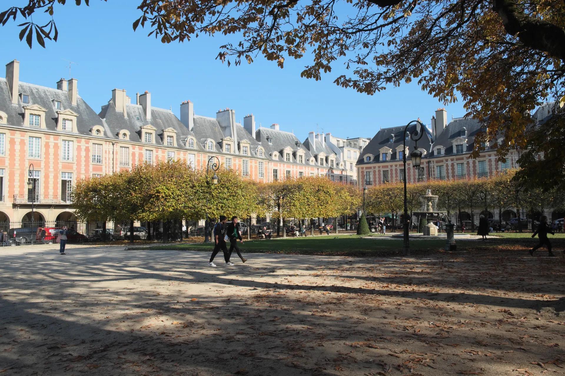 Brick and stone houses around the Place des Vosges in autumn