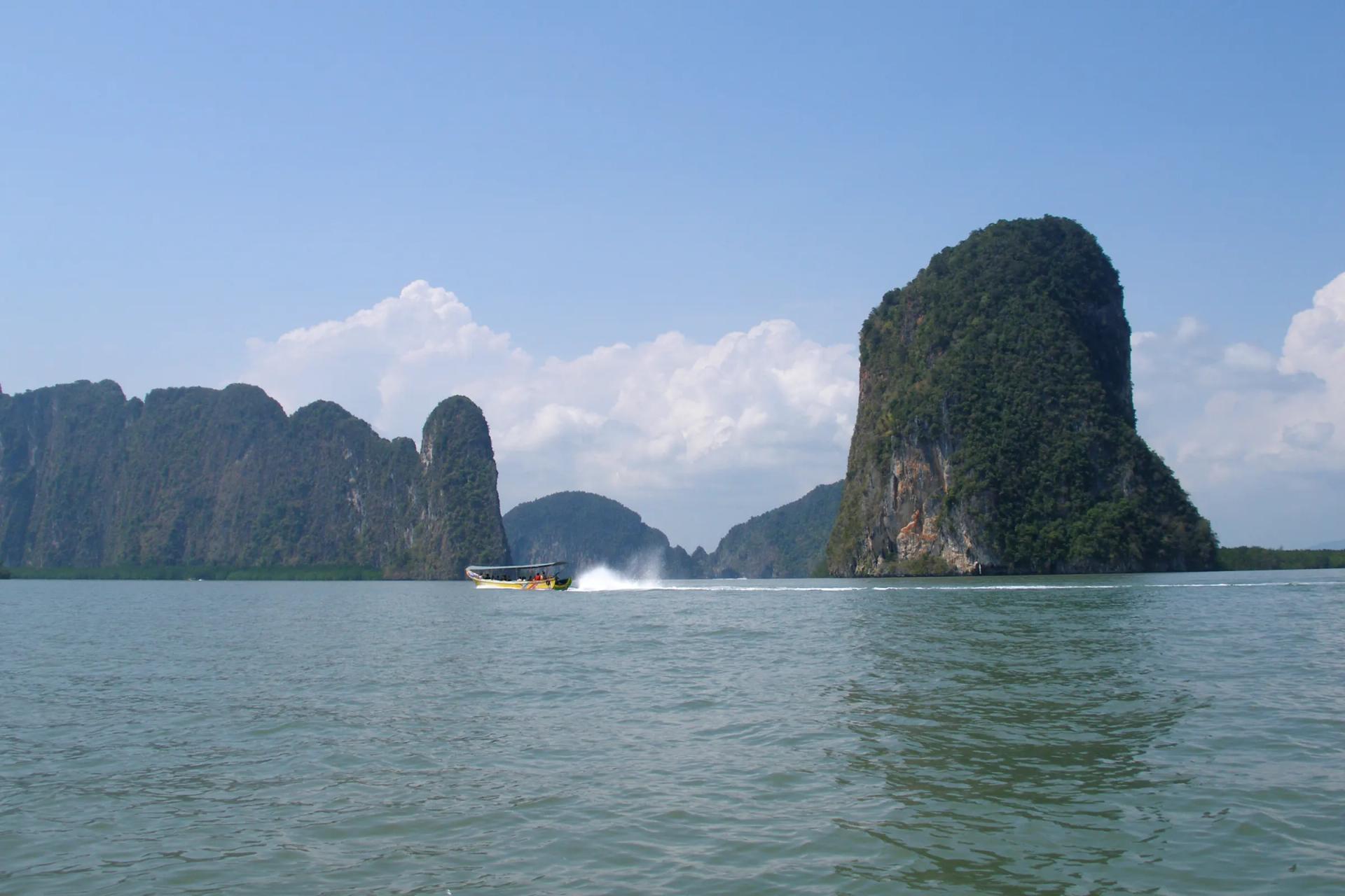 Limestone karst islands rising from Phang Nga Bay