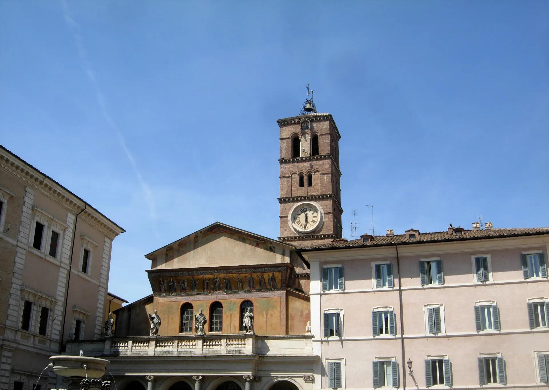 Santa Maria in Trastevere basilica and bell tower on its piazza