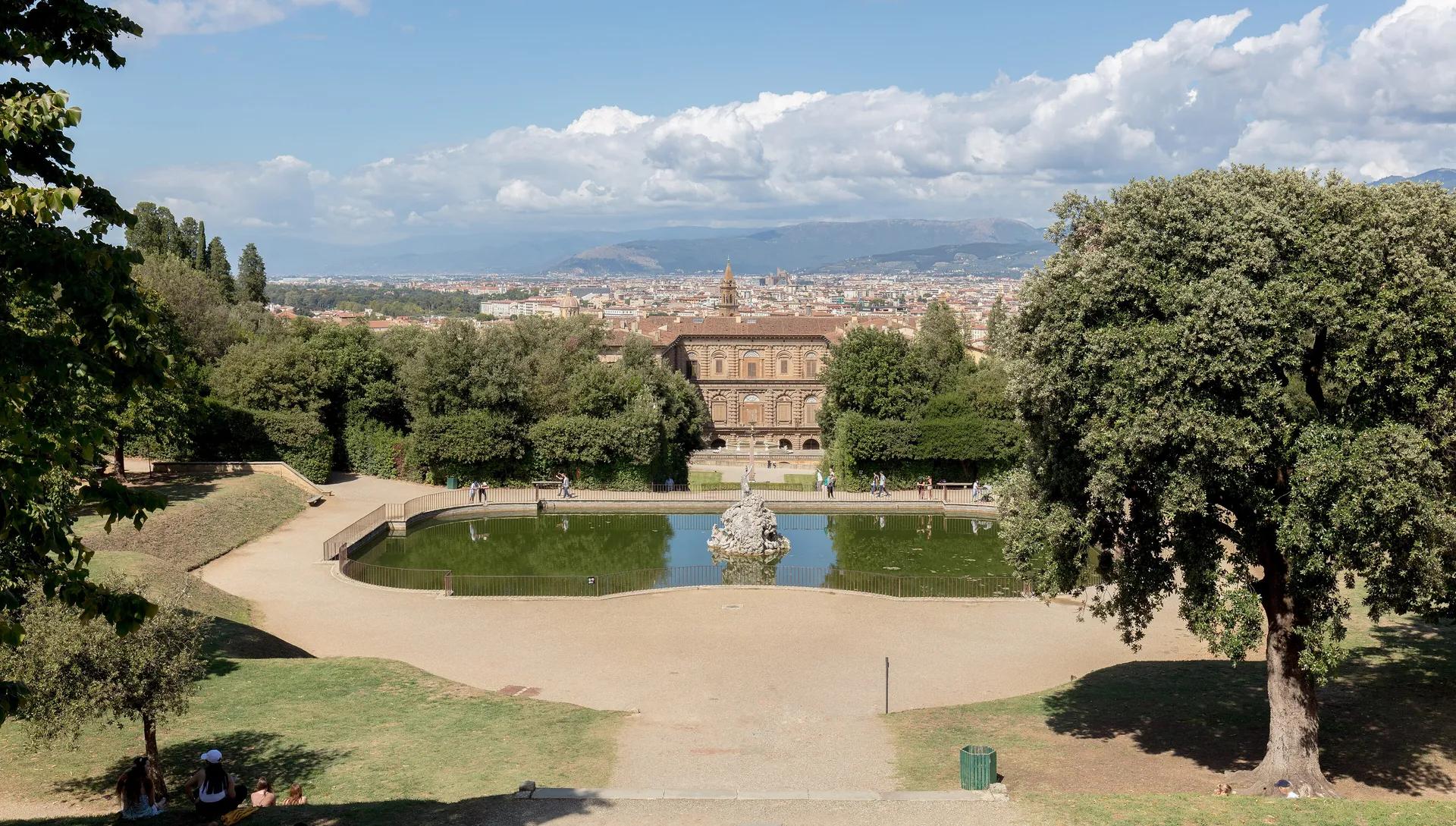 Neptune pond in the Boboli Gardens with Palazzo Pitti and Florence beyond