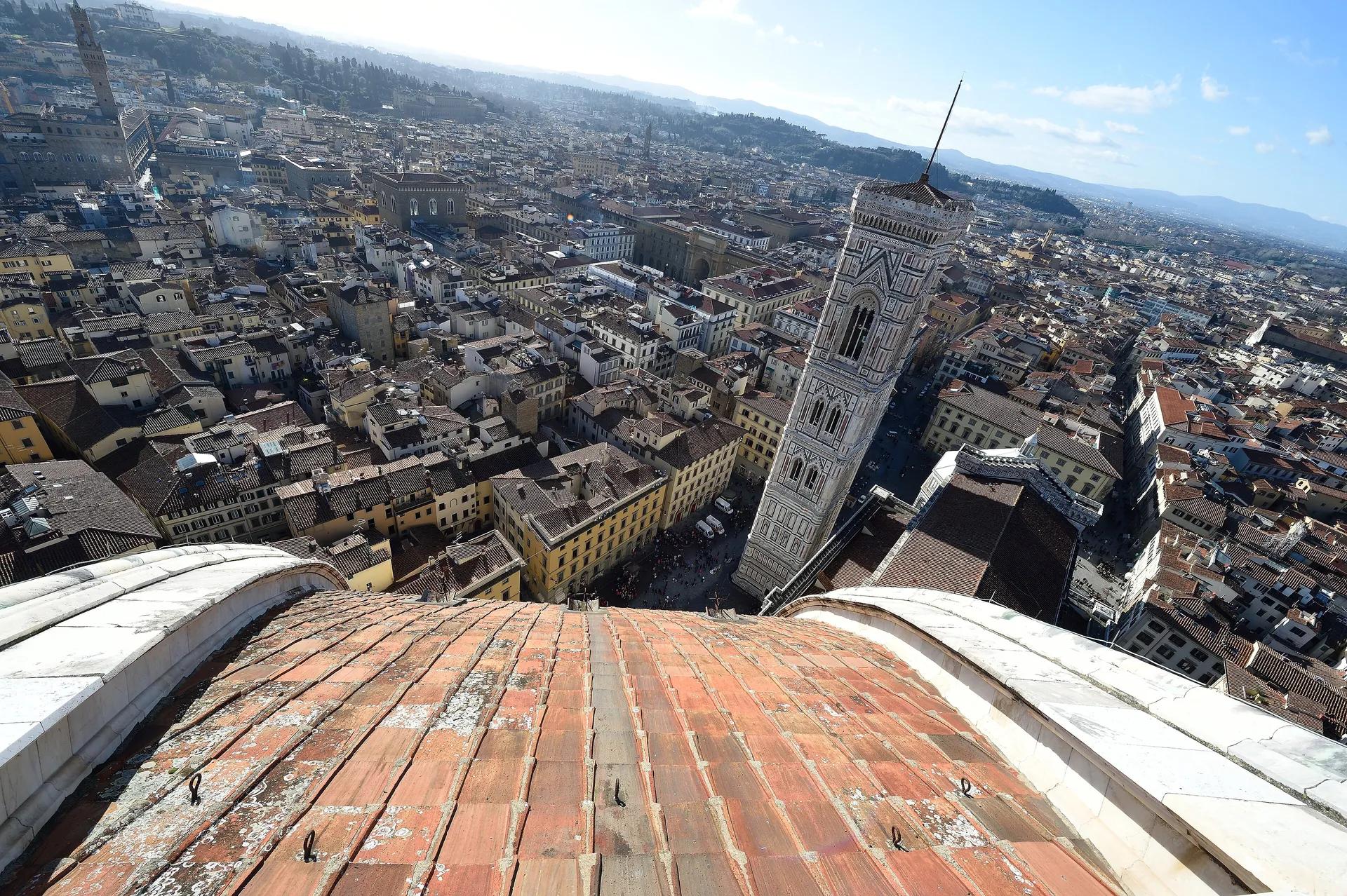View over the rooftops of Florence and Giotto’s bell tower from the top of the cathedral dome