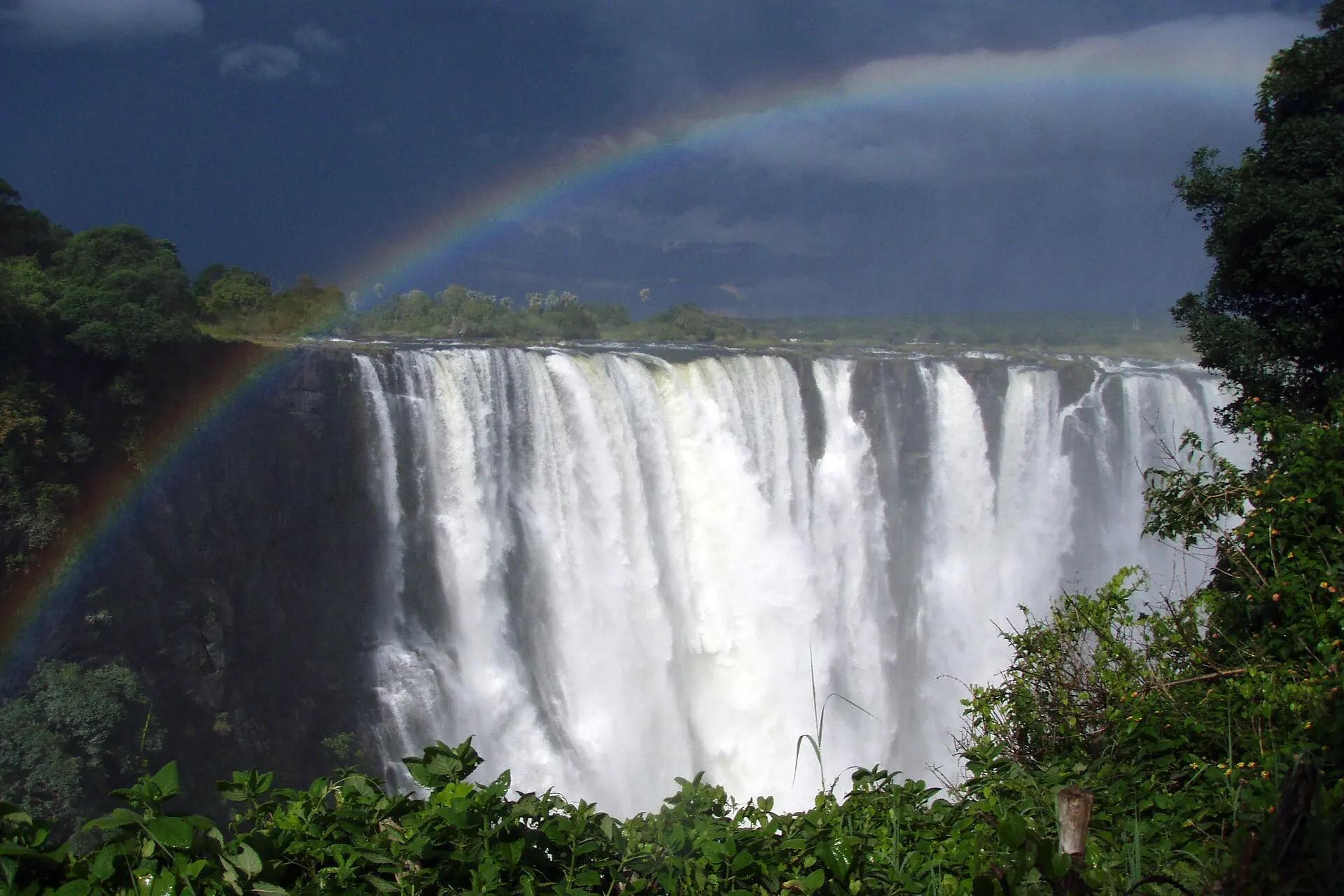 Main Falls with a rainbow seen through the rainforest, Zimbabwe side