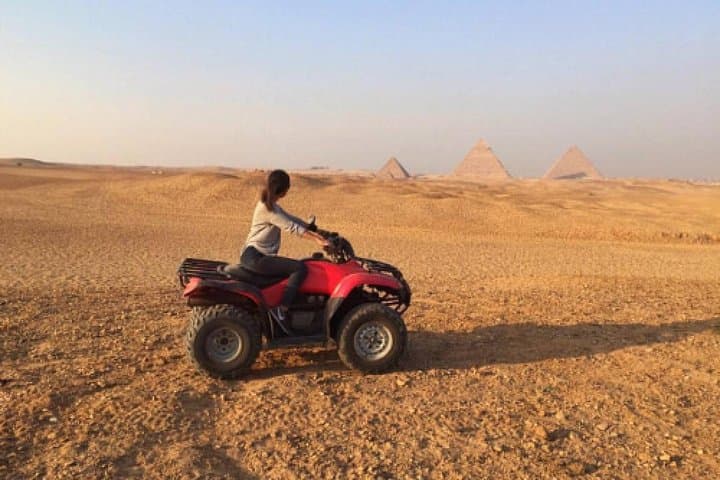 Quad Bike Trip during sunset around Pyramids, evening attend the sound & light show at Giza Pyramids with Dinner