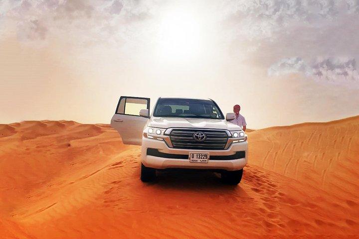 Safari matinal dans le désert avec traversée des dunes en 4x4, balade à dos de chameau et sandboard