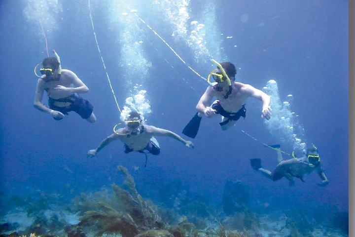 Pakkerejser til snorkling, hooka dykning og parasailing