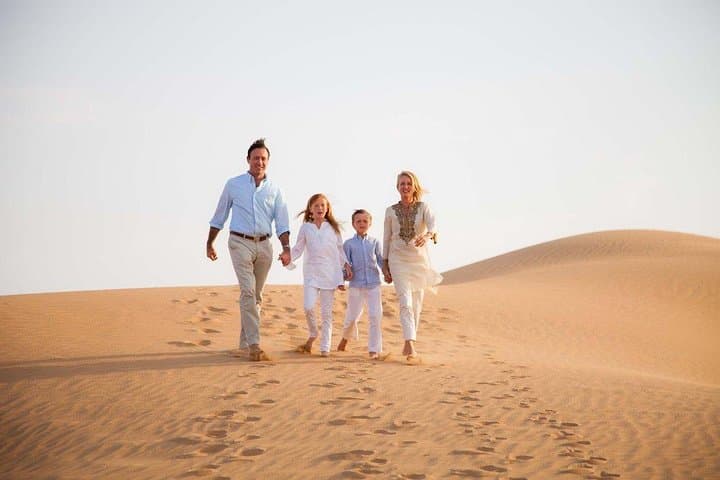 Morning Red Dunes Safari: Camel Ride & Sandboarding Adventure