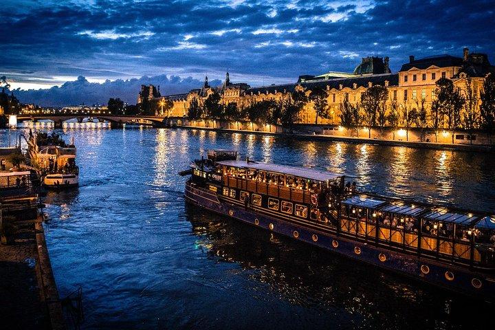 Paris By Night with Seine River Cruise and Roundtrip Luxury Transportation