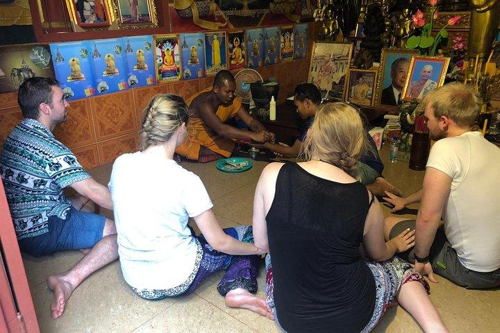 Buddhist Water Blessing and Real Life Experience with Local