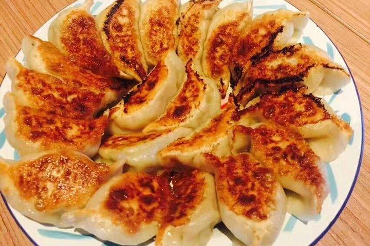Tour in mountain bike di Pechino Hutong privato di 4 ore con pranzo al Dumpling