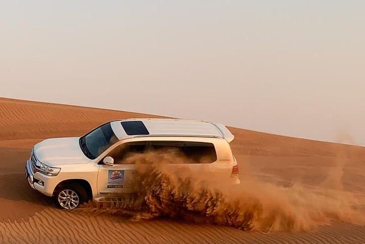 Private Dubai Desert Safari: BBQ Dinner, Sandboarding & 5 Shows