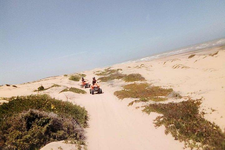 1h fyrhjuling på stranden