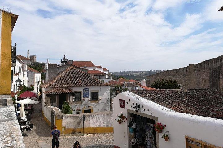 Private Tour von Lissabon nach Porto, via Obidos Nazare Aveiro