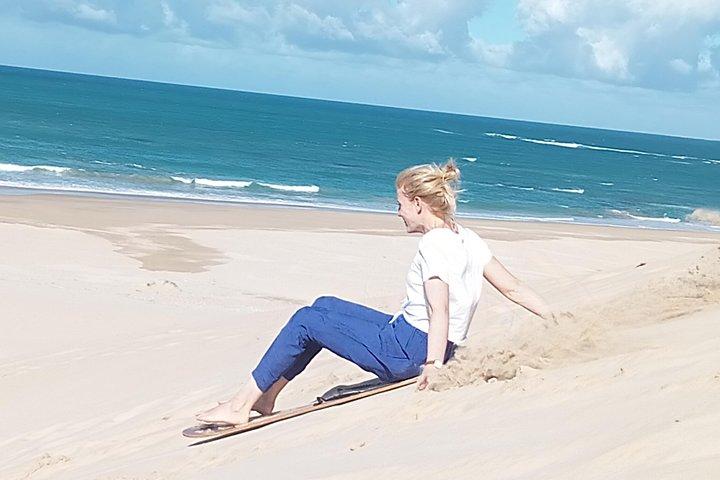 Sandboarding i Jeffreys Bay, Sydafrika