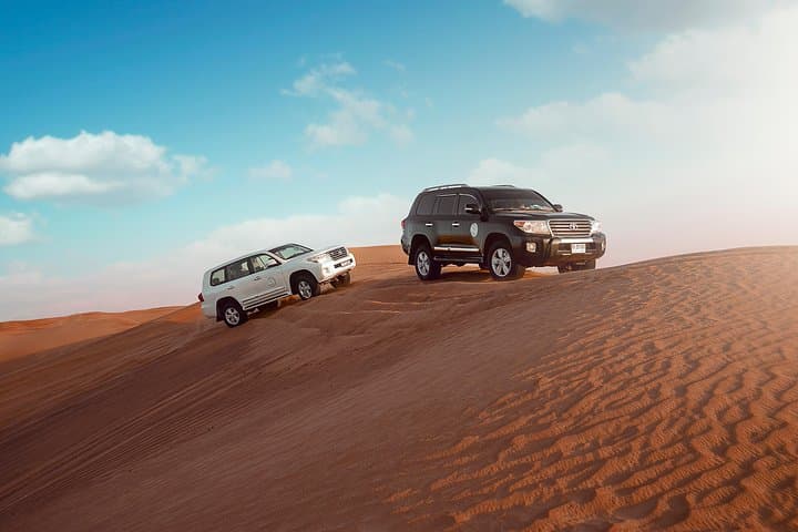 Desert Safari Dubai with Dune Bashing, Sandboarding, Camel Ride, 5 Shows, Dinner