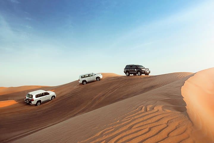 Desert Safari Dubai with Dune Bashing, Sandboarding, Camel Ride, 5 Shows, Dinner