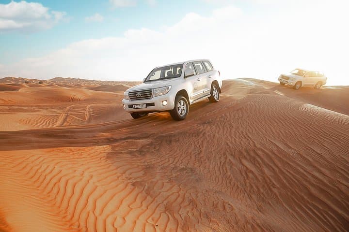 Desert Safari Dubai with Dune Bashing, Sandboarding, Camel Ride, 5 Shows, Dinner