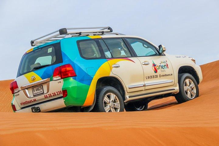 Morning Dubai Desert Safari with Camel Ride & Sand boarding