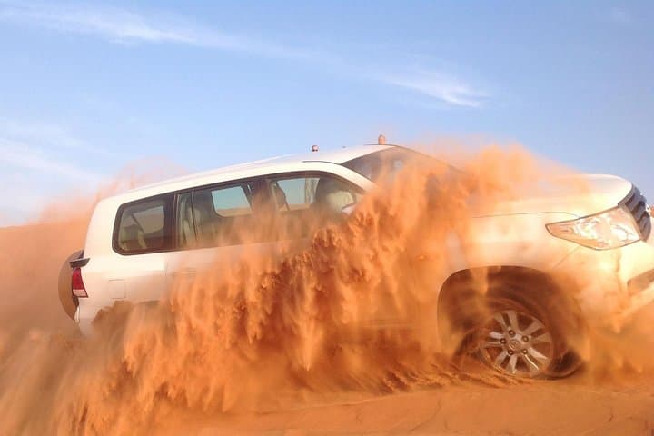 Dubai Desert Safari Morning with Camel Ride and Sand Boarding