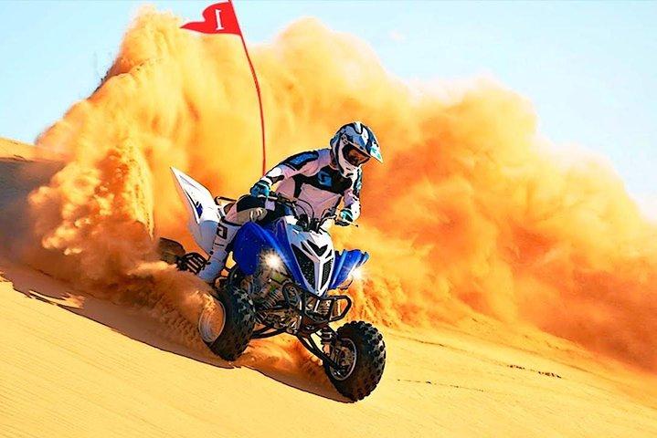 Experiencia en vehículos todo terreno y quads en Qatar con sandboarding