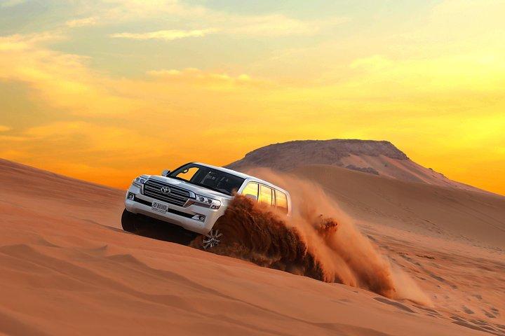 Dubai: Red Dune Bashing Safari, Sand Surf, Quad Bike & Camel Ride