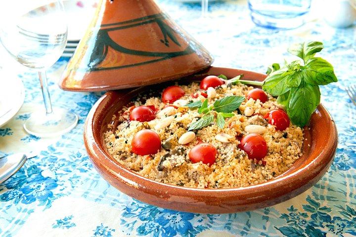 Experiencia gastronómica en casa de un local en Stresa con cocina en vivo