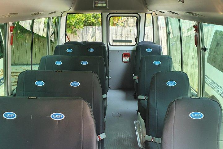 Autobús corporativo, traslado privado, aeropuerto de Cairns - ciudad de Cairns.