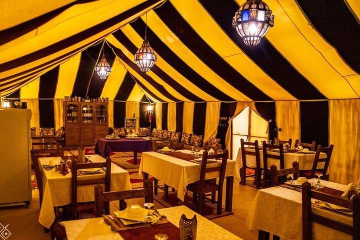 Merzouga: Overnight in Luxury Desert Camp with Camel Ride, meals & sandboarding