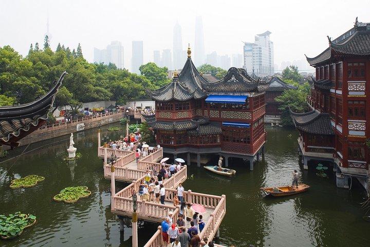 Private Zwischenstopp durch die Highlights der Stadt Shanghai und den lokalen Markt mit Abholung