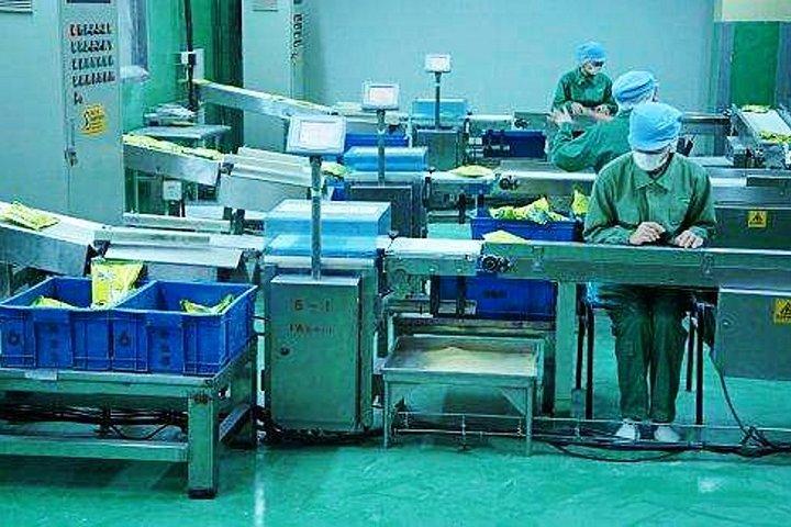 Tour privato della Shanghai Totole Food Company con punti salienti della città