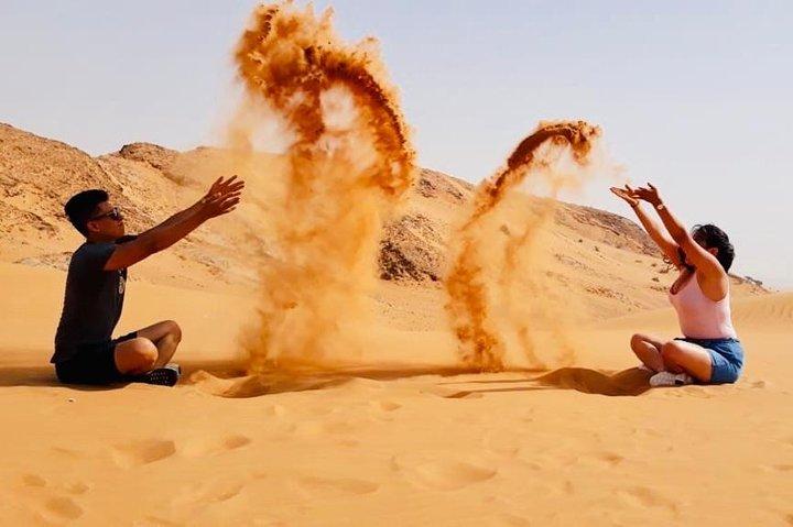 Morgenrøde klitter med kameltur, sandboarding og forfriskninger