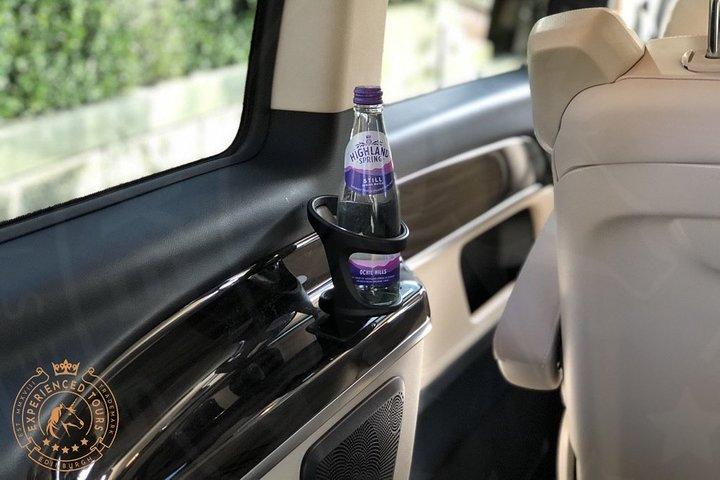 Tour privato di un giorno delle Highlands, del whisky e dei castelli in un minivan premium