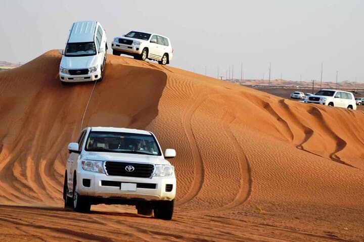 Private Red Dune Desert Safari With BBQ Dinner & Shows