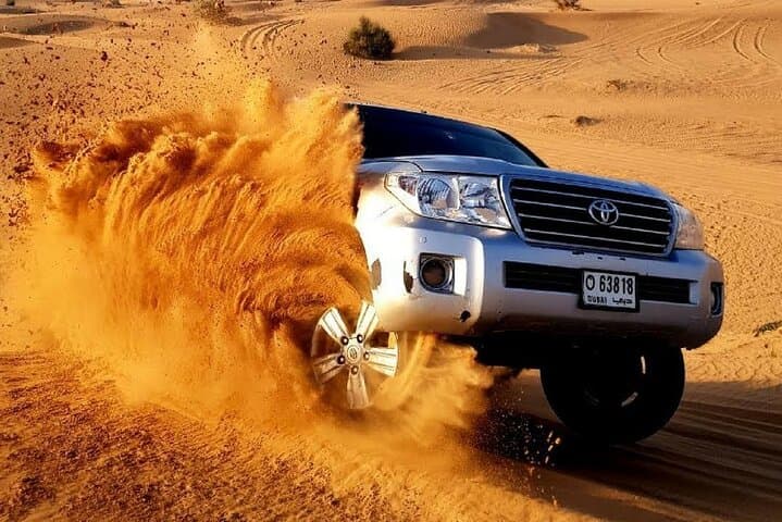 Evening Red Dunes Desert Safari: BBQ Dinner & Adventure Awaits!