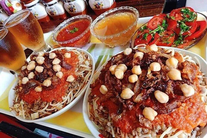 カイロのナイルフェルッカとカイロまたはギザのホテルの伝統料理コシュリー